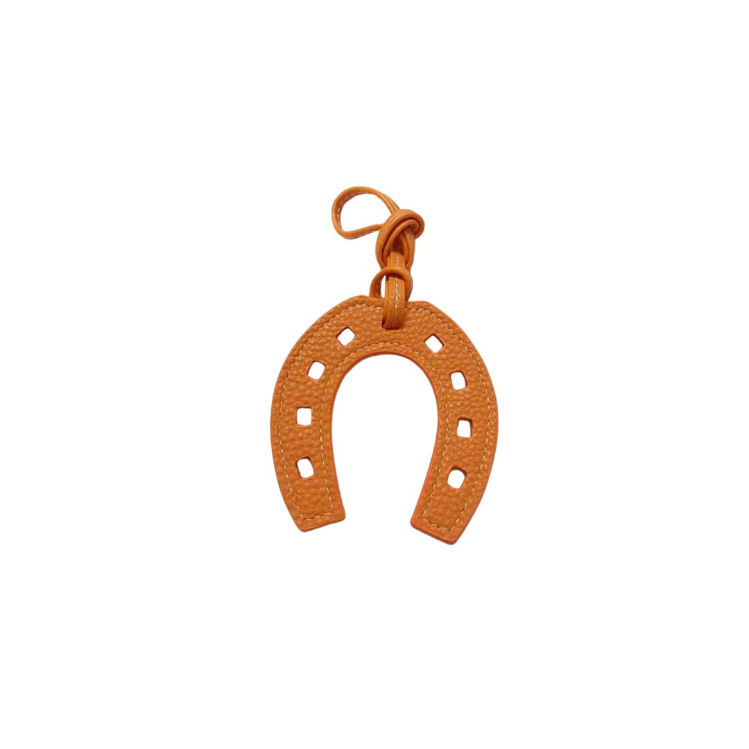 ORANGE HORSESHOE CHARM