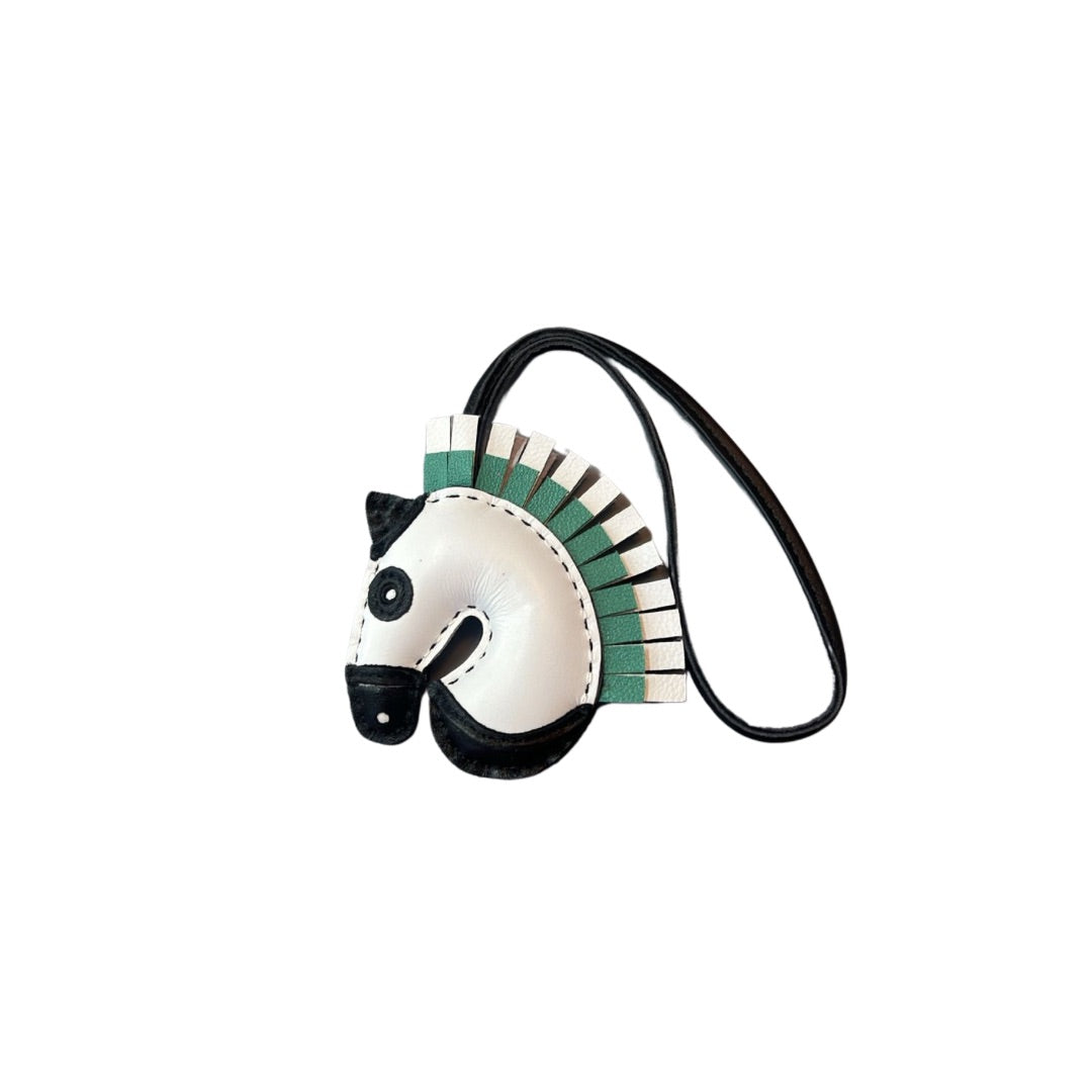 BLACK AND WHITE HORSE CHARM