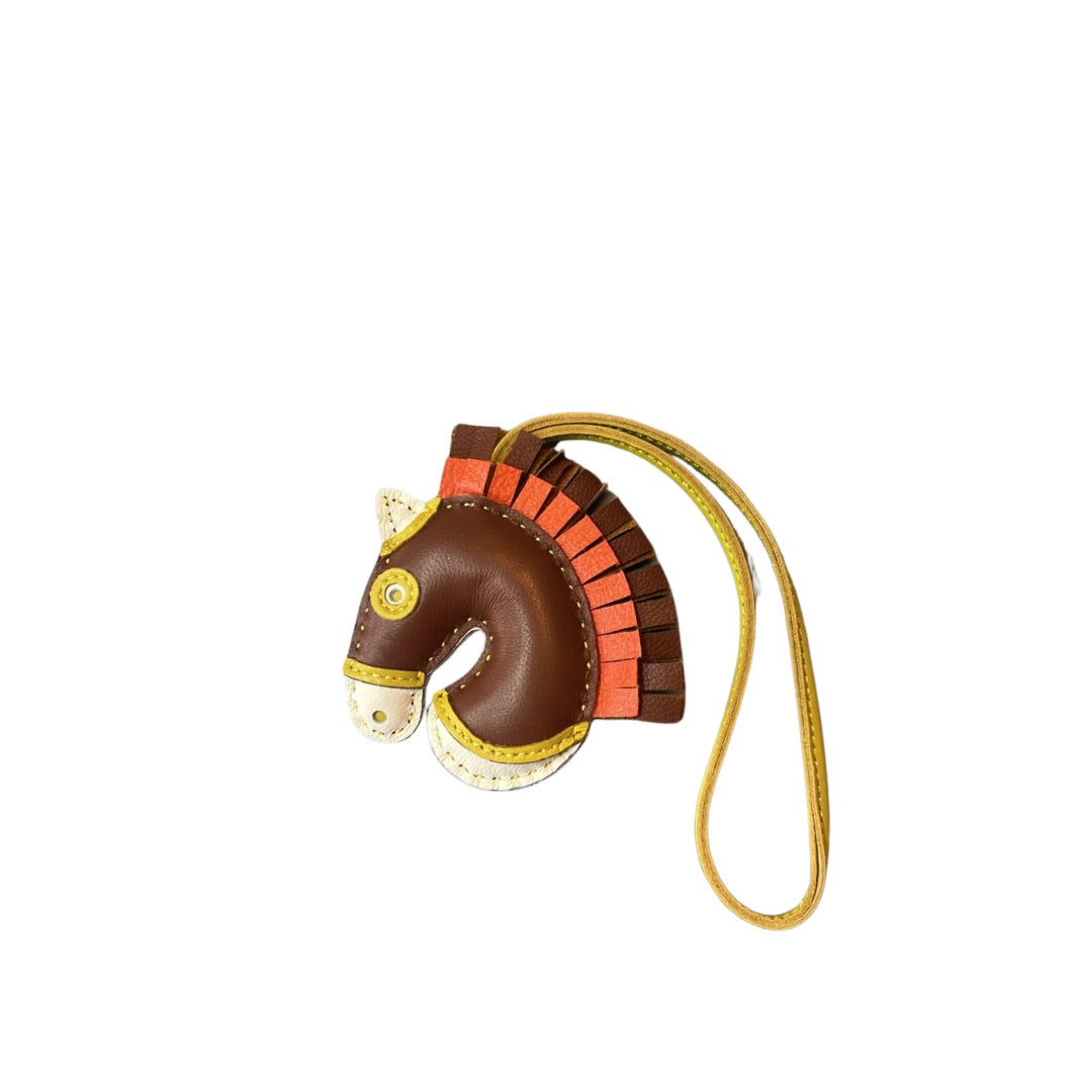 BROWN AND ORANGE HORSE CHARM